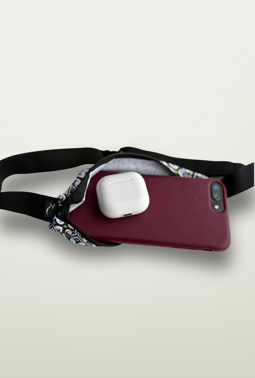 Phone case with a strap and white object on a light background