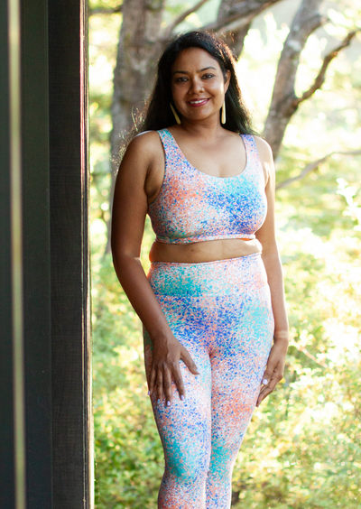 Woman in sports crop top with multiple colours 