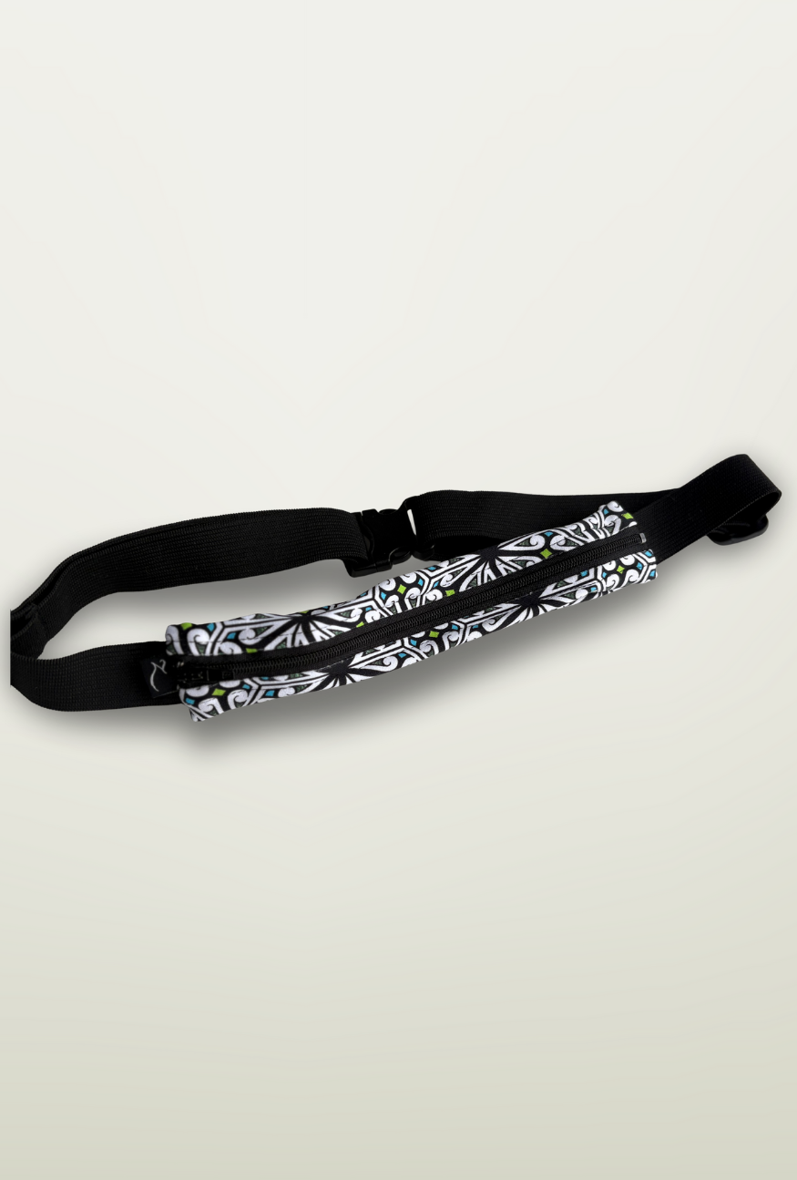 Black running belt bag with white maori pattern on a light grey background